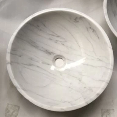 Stroški potonov iz belega marmorja Carrara